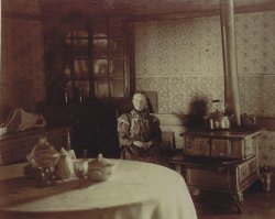 Elbert Benjamine's Grandmother who largely raised him. Sitting in her kitchen at age 70.