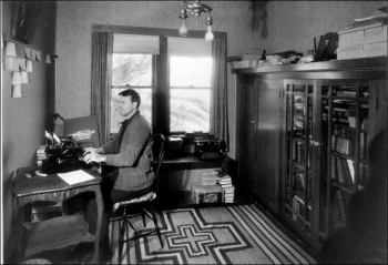 Elbert Benjamine at his writing desk